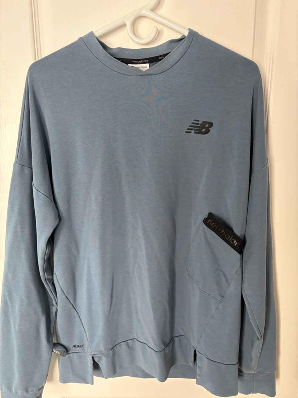Men’s long sleeve New Balance shirt in blue